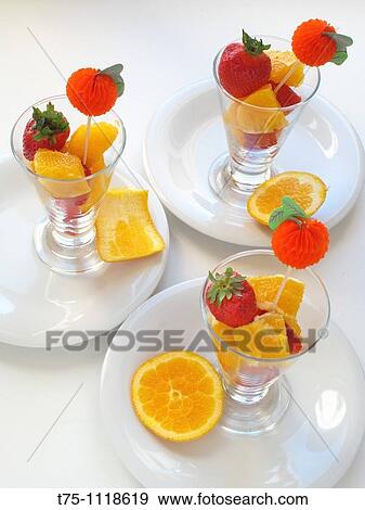 Cups with orange and strawberries View Large Photo Image Stock Photo - Cups with orange and strawberries. Fotosearch