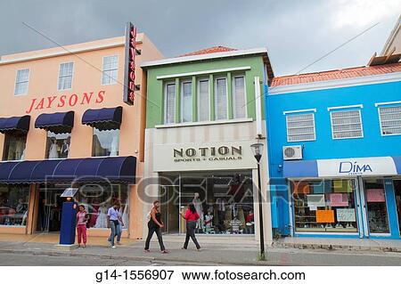 Cura? ao, Netherlands Antilles, Dutch, Willemstad, Otrobanda, Breedestraat, UNESCO World Heritage Site, shopping, storefront, business, clothing, apparel, sign, Black, woman, pedestrian, street parking pay station, View Large Photo Image Stock Photo - Cura? ao, Netherlands Antilles, Dutch, Willemstad, Otrobanda, Breedestraat, UNESCO World Heritage Site, shopping, storefront, business, clothing, apparel, sign, Black, woman, pedestrian, street parking pay station,. Fotosearch