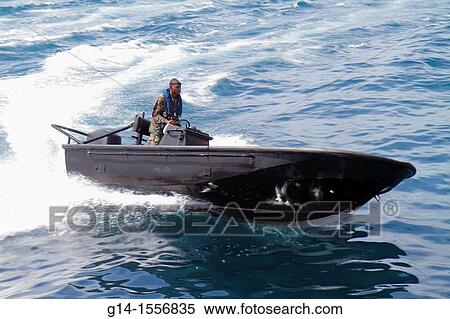 Cura? ao, Netherlands Antilles, Dutch, Willemstad, Otrobanda, Punda, St Sint Anne Bay, Koningin Julianabrug, military exercise, training, man, power boat, soldier, speed, uniform, View Large Photo Image Stock Photography - Cura? ao, Netherlands Antilles, Dutch, Willemstad, Otrobanda, Punda, St Sint Anne Bay, Koningin Julianabrug, military exercise, training, man, power boat, soldier, speed, uniform,. Fotosearch