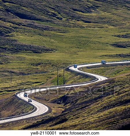 Stock Image - Curvy Road, Oxnadalsheidi Heath, Northern Iceland.. Fotosearch