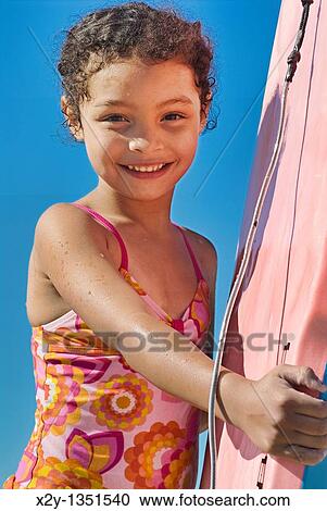 Cute girl with boggieboard at the beach Cape Cod, MA View Large Photo Image Stock Image - Cute girl with boggieboard at the beach Cape Cod, MA. Fotosearch