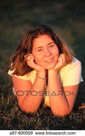 Cute teen girl outdoors View Large Photo Image Stock Photo - Cute teen girl outdoors. Fotosearch