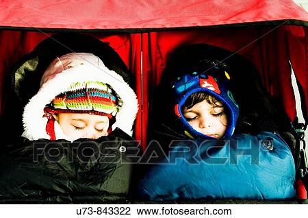 Cute twins fast asleep View Large Photo Image Stock Image - Cute twins fast asleep. Fotosearch