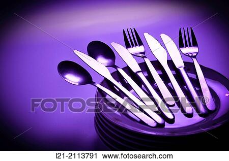 Cutlery on a stack of dishes. View Large Photo Image Stock Image - Cutlery on a stack of dishes.. Fotosearch