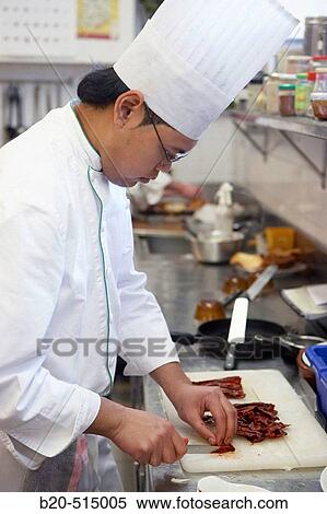 Stock Photography - Cutting dry pimientos choriceros, Luis Irizar Cooking School, Donostia, San Sebastian, Gipuzkoa, Euskadi. Spain.. Fotosearch
