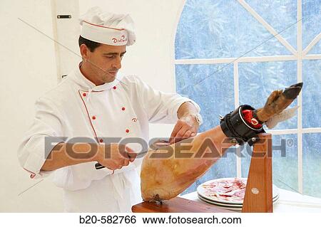Cutting ham. Wedding. Divinus Catering, San Sebastian, Donostia, Gipuzkoa, Euskadi. Spain. View Large Photo Image Stock Photograph - Cutting ham. Wedding. Divinus Catering, San Sebastian, Donostia, Gipuzkoa, Euskadi. Spain.. Fotosearch