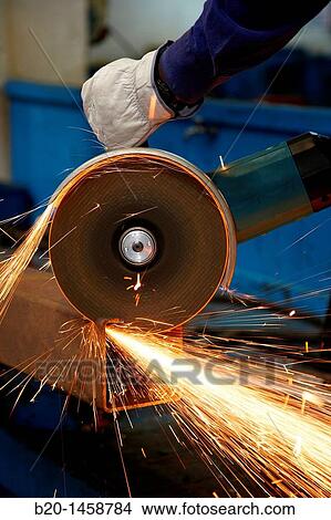 Cutting square hollow steel section, grinding machine with abrasive wheel, metallurgy, Legazpi, Gipuzkoa, Euskadi, Spain View Large Photo Image Picture - Cutting square hollow steel section, grinding machine with abrasive wheel, metallurgy, Legazpi, Gipuzkoa, Euskadi, Spain. Fotosearch