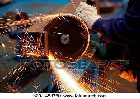 Stock Image - Cutting square hollow steel section, grinding machine with abrasive wheel, metallurgy, Legazpi, Gipuzkoa, Euskadi, Spain. Fotosearch