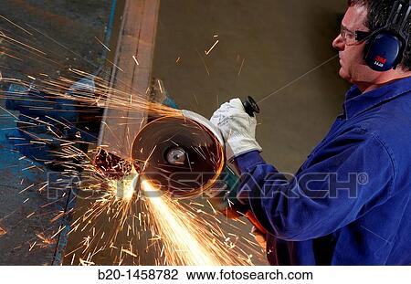 Stock Image - Cutting square hollow steel section, grinding machine with abrasive wheel, metallurgy, Legazpi, Gipuzkoa, Euskadi, Spain. Fotosearch