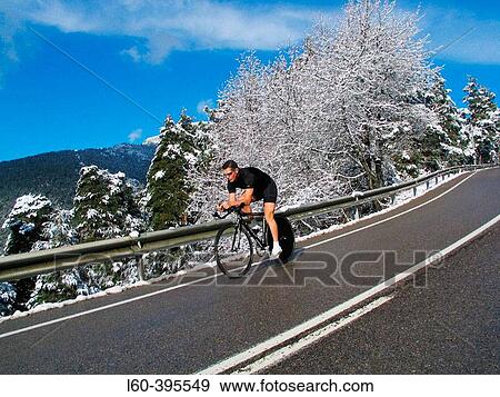 Cycling in Navacerrada. Spain. View Large Photo Image Stock Photo - Cycling in Navacerrada. Spain.. Fotosearch