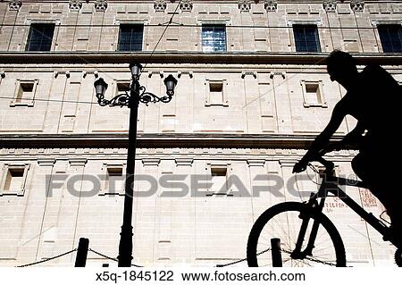 Cyclist in front of Sagrario Church, Constitution Avenue, Seville, Spain View Large Photo Image Stock Image - Cyclist in front of Sagrario Church, Constitution Avenue, Seville, Spain. Fotosearch