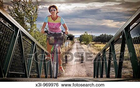 Cyclist in the V? a Verde Tarazonica Navarra Spain View Large Photo Image Stock Photograph - Cyclist in the V? a Verde Tarazonica Navarra Spain. Fotosearch