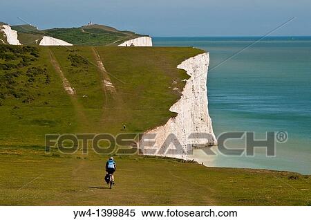 Cyclist on Chalk cliffs of the Seven Sisters, South Dawns Way, Sussex, England, UK View Large Photo Image Stock Photography - Cyclist on Chalk cliffs of the Seven Sisters, South Dawns Way, Sussex, England, UK. Fotosearch