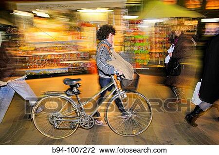 Cyclist on Las Ramblas, Barcelona, Catalonia, Spain View Large Photo Image Stock Image - Cyclist on Las Ramblas, Barcelona, Catalonia, Spain. Fotosearch
