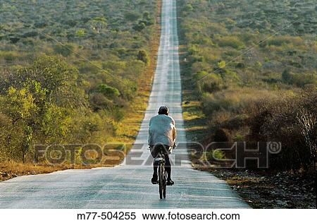 Cyclist. Tul? ar, road 7, Antananarivo. Madagascar. View Large Photo Image Stock Photography - Cyclist. Tul? ar, road 7, Antananarivo. Madagascar.. Fotosearch