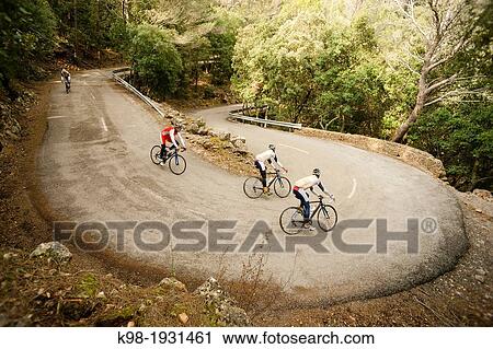 cyclists descending the hill of Honor, Bunyola-Orient Road, Tramuntana, mallorca, Balearic Islands, Spain, Europe View Large Photo Image Stock Image - cyclists descending the hill of Honor, Bunyola-Orient Road, Tramuntana, mallorca, Balearic Islands, Spain, Europe. Fotosearch