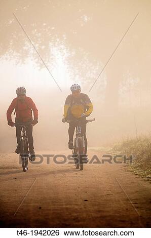 Stock Photograph - Cyclists, Guadarrama Regional Park, Villanueva de la Caada, Madrid Province, Spain. Fotosearch