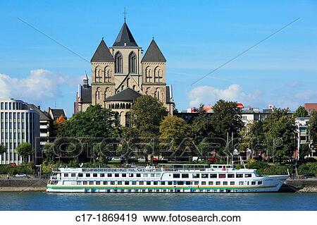 D-Cologne, Rhine, Rhineland, North Rhine-Westphalia, NRW, town view, old city, Rhine promenade, St Kuniberts Church, Romanesque church, Basilica minor, catholic church, excursion ship View Large Photo Image Stock Photo - D-Cologne, Rhine, Rhineland, North Rhine-Westphalia, NRW, town view, old city, Rhine promenade, St Kuniberts Church, Romanesque church, Basilica minor, catholic church, excursion ship. Fotosearch