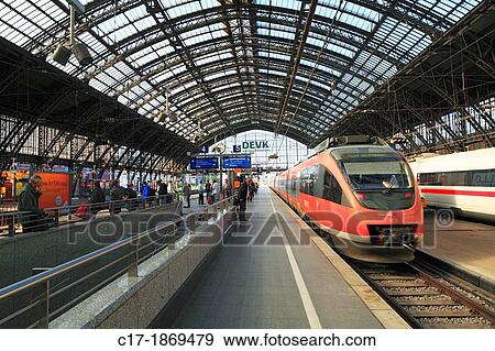 D-Cologne, Rhine, Rhineland, North Rhine-Westphalia, NRW, Cologne Central Station, Deutsche Bahn, German Railways, station concourse, train shed, rail, train, people, railway passengers View Large Photo Image Stock Photo - D-Cologne, Rhine, Rhineland, North Rhine-Westphalia, NRW, Cologne Central Station, Deutsche Bahn, German Railways, station concourse, train shed, rail, train, people, railway passengers. Fotosearch