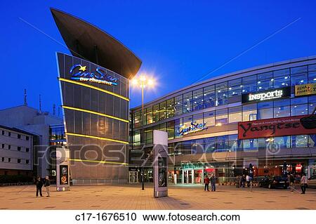Stock Image - D-Dortmund, Ruhr area, Westphalia, North Rhine-Westphalia, NRW, Giant cinema CineStar, evening mood, illuminated. Fotosearch