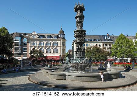 D-Koblenz, Rhine, Moselle, Maifeld, Eifel, Hunsrueck, Westerwald, Rhineland-Palatinate, old city, Josef Goerres Square, spring with historic pillar by Juergen Weber, Historiensaeule, left behind the Palais, cafe, restaurant, UNESCO World Heritage Site View Large Photo Image Stock Image - D-Koblenz, Rhine, Moselle, Maifeld, Eifel, Hunsrueck, Westerwald, Rhineland-Palatinate, old city, Josef Goerres Square, spring with historic pillar by Juergen Weber, Historiensaeule, left behind the Palais, cafe, restaurant, UNESCO World Heritage Site. Fotosearch