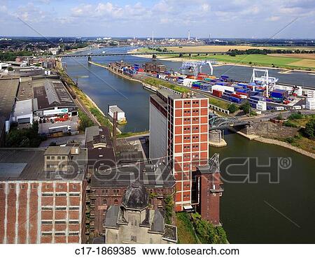 D-Krefeld, Rhine, Lower Rhine, Rhineland, North Rhine-Westphalia, NRW, panoramic view, Rheinhafen Krefeld, Rhine harbour, industrial port, Container Terminal, Rhine bridge between Krefeld-Uerdingen and Duisburg-Muendelheim, Ruhr area View Large Photo Image Stock Photography - D-Krefeld, Rhine, Lower Rhine, Rhineland, North Rhine-Westphalia, NRW, panoramic view, Rheinhafen Krefeld, Rhine harbour, industrial port, Container Terminal, Rhine bridge between Krefeld-Uerdingen and Duisburg-Muendelheim, Ruhr area. Fotosearch