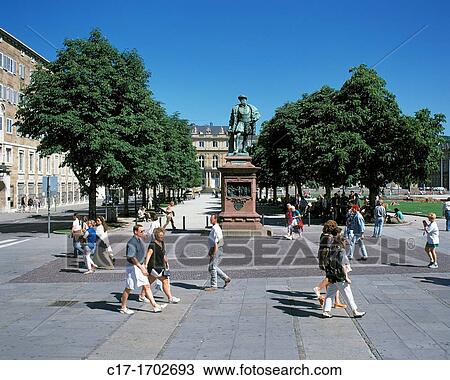 Stock Image - D-Stuttgart, Neckar, Baden-Wuerttemberg, Schlossplatz, Koenigstrasse, pedestrians, passersby, monument Duke Christoph of Wuerttemberg. Fotosearch