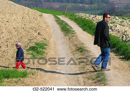 Dad and son going different ways View Large Photo Image Stock Image - Dad and son going different ways. Fotosearch