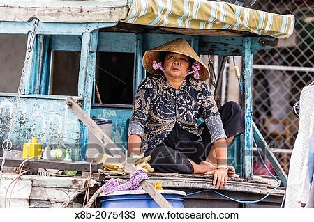 Daily Vietnamese river life at Cai Be, Mekong River Delta, Vietnam. View Large Photo Image Stock Image - Daily Vietnamese river life at Cai Be, Mekong River Delta, Vietnam.. Fotosearch