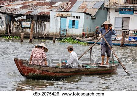 Daily Vietnamese river life at Cai Be, Mekong River Delta, Vietnam. View Large Photo Image Stock Photograph - Daily Vietnamese river life at Cai Be, Mekong River Delta, Vietnam.. Fotosearch