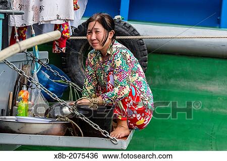 Daily Vietnamese river life at Cai Be, Mekong River Delta, Vietnam. View Large Photo Image Stock Photograph - Daily Vietnamese river life at Cai Be, Mekong River Delta, Vietnam.. Fotosearch