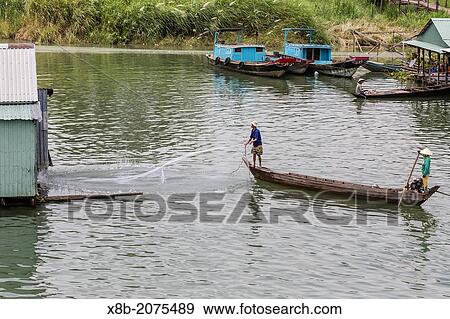 Daily Vietnamese river life on the Tan Chau Canal, Mekong River Delta, Vietnam. View Large Photo Image Stock Photo - Daily Vietnamese river life on the Tan Chau Canal, Mekong River Delta, Vietnam.. Fotosearch
