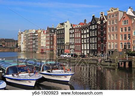 Damrak, Amsterdam, Netherlands View Large Photo Image Stock Image - Damrak, Amsterdam, Netherlands. Fotosearch
