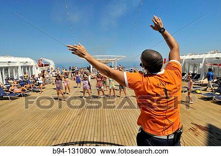 Dance on the deck of a cruise ship View Large Photo Image Stock Image - Dance on the deck of a cruise ship. Fotosearch