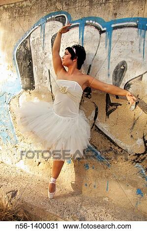 Stock Image - Dancer by graffiti. Fotosearch
