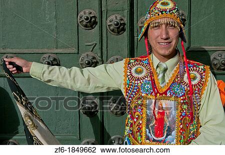 Dancer in native costume colorful beads in Main Square in Cusco Cuzco Peru View Large Photo Image Stock Image - Dancer in native costume colorful beads in Main Square in Cusco Cuzco Peru. Fotosearch