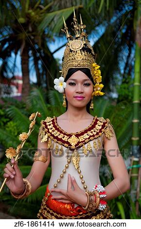 Picture - Dancer in native traditional gold ancient dance costume in Siem Reap Cambodia Asia. Fotosearch