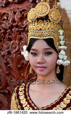 Dancer in native traditional gold ancient dance costume in Siem Reap Cambodia Asia View Large Photo Image Stock Image - Dancer in native traditional gold ancient dance costume in Siem Reap Cambodia Asia. Fotosearch