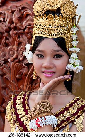 Dancer in native traditional gold ancient dance costume in Siem Reap Cambodia Asia View Large Photo Image Stock Image - Dancer in native traditional gold ancient dance costume in Siem Reap Cambodia Asia. Fotosearch