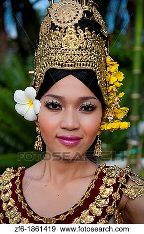 Dancer in native traditional gold ancient dance costume in Siem Reap Cambodia Asia View Large Photo Image Stock Photo - Dancer in native traditional gold ancient dance costume in Siem Reap Cambodia Asia. Fotosearch
