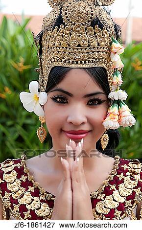 Dancer in native traditional gold ancient dance costume in Siem Reap Cambodia Asia View Large Photo Image Stock Photo - Dancer in native traditional gold ancient dance costume in Siem Reap Cambodia Asia. Fotosearch
