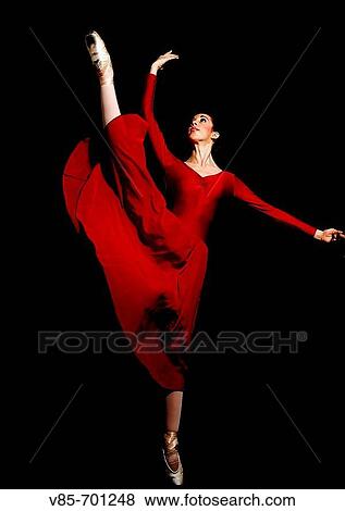 Dancer in red dress View Large Photo Image Stock Photo - Dancer in red dress. Fotosearch
