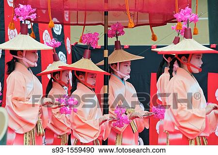 Stock Image - Dancers taking part in the Hanezu Odori. Fotosearch