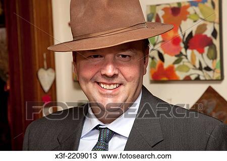 Dapper young man happy in his new fedora hat age 40. St Paul Minnesota MN USA. View Large Photo Image Stock Image - Dapper young man happy in his new fedora hat age 40. St Paul Minnesota MN USA.. Fotosearch