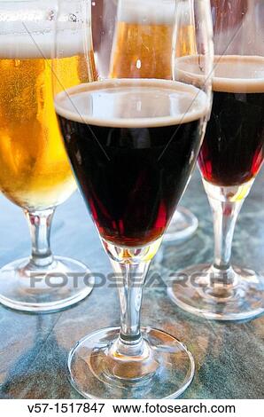 Dark and lager beer. Close view. View Large Photo Image Stock Photo - Dark and lager beer. Close view.. Fotosearch