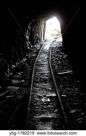 dark tunnel in slate quarry in wales View Large Photo Image Stock Photo - dark tunnel in slate quarry in wales. Fotosearch