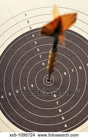 dart in a target View Large Photo Image Picture - dart in a target. Fotosearch