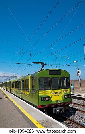 Stock Photograph - DART train at railway station Howth peninsula near Dublin Ireland Europe.. Fotosearch