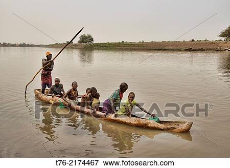 Dassanech dugout canoe on the Omo River, South Omo Valley, Ethiopia View Large Photo Image Stock Photo - Dassanech dugout canoe on the Omo River, South Omo Valley, Ethiopia. Fotosearch