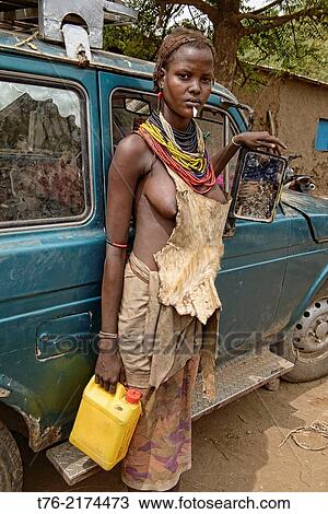 Dassanech young woman in Omorate in the South Omo Valley of Ethiopia. View Large Photo Image Stock Image - Dassanech young woman in Omorate in the South Omo Valley of Ethiopia.. Fotosearch
